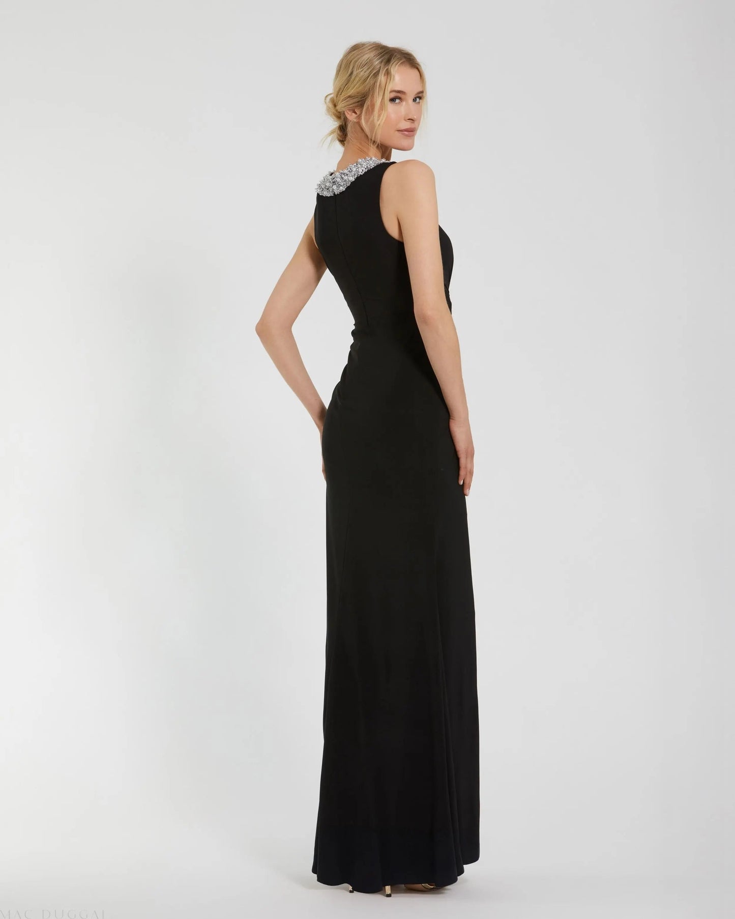 Black Jersey Sleeveless Beaded Neck Gown With Twist