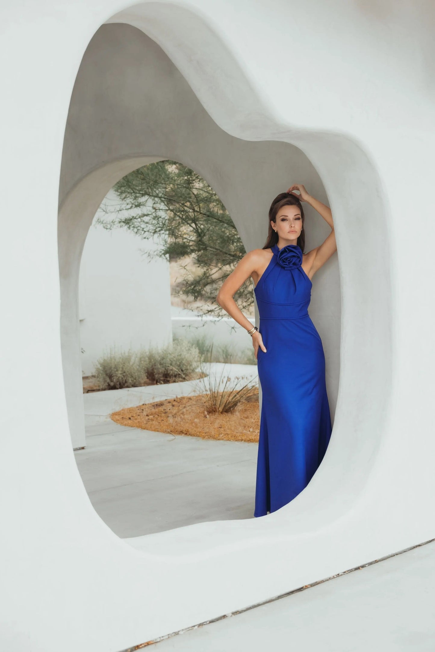 Blue Sleeveless Halter Neck Gown with Rosette Detail