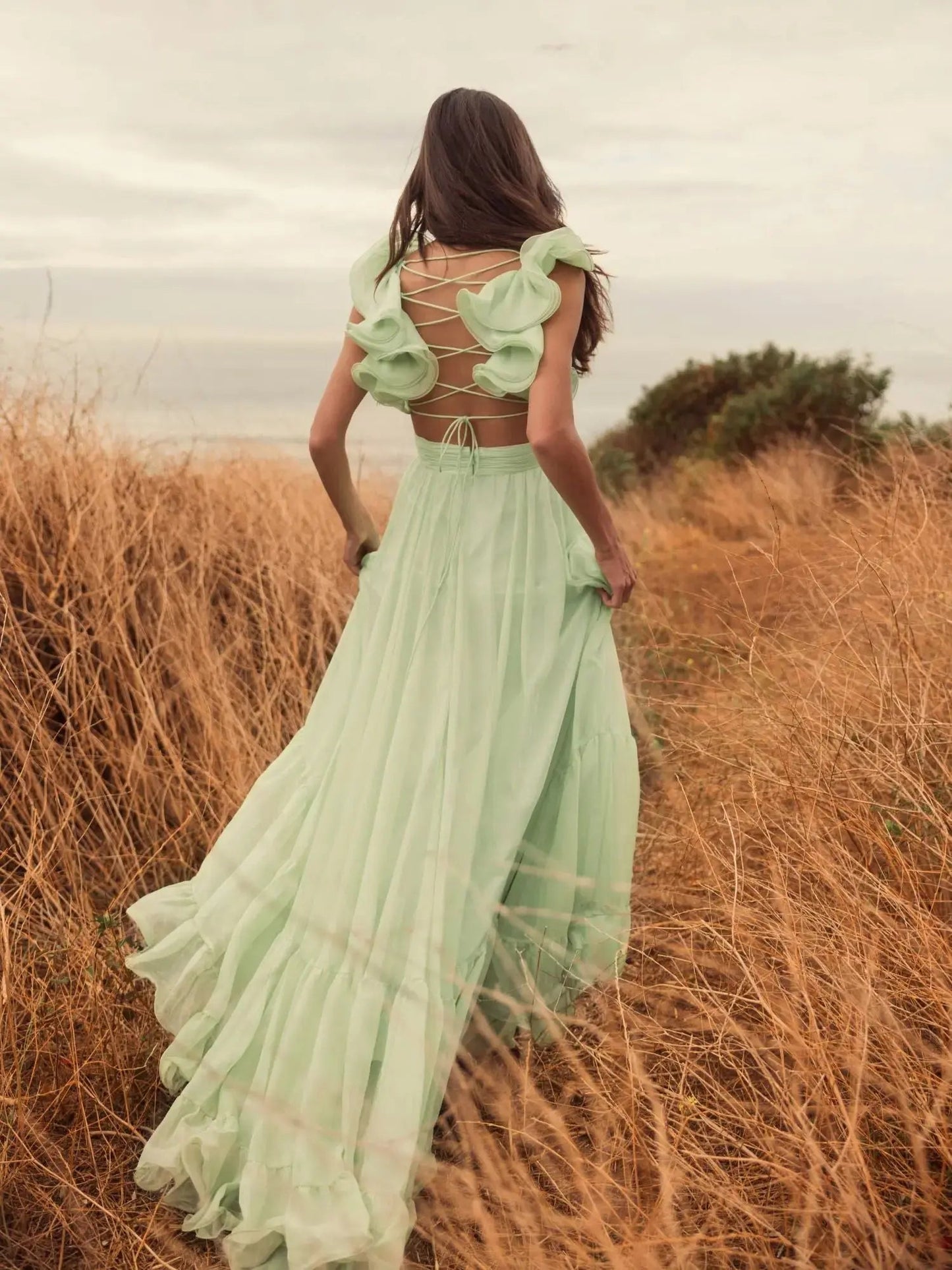 Light Green Ruffle Tiered Cut-Out Chiffon Gown